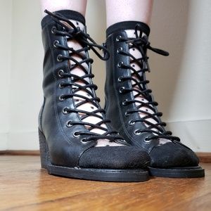 Open lace up black chunky heels.
